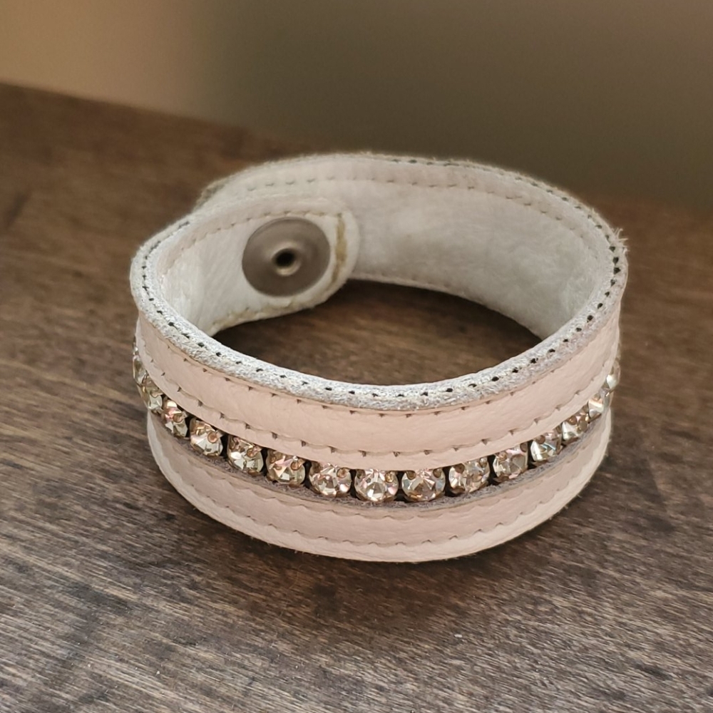 White leather and rhinestone bracelet.